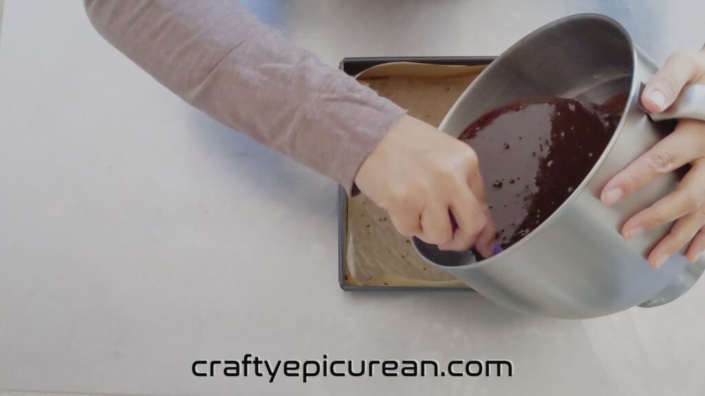 Pouring Batter into Lined Baking Tin