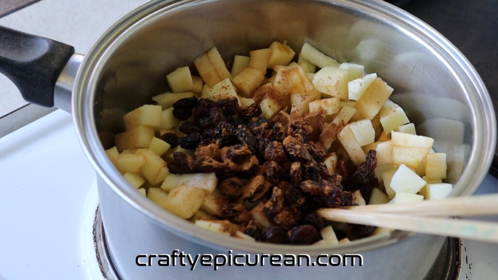 Adding Sultanas and Cinnamon